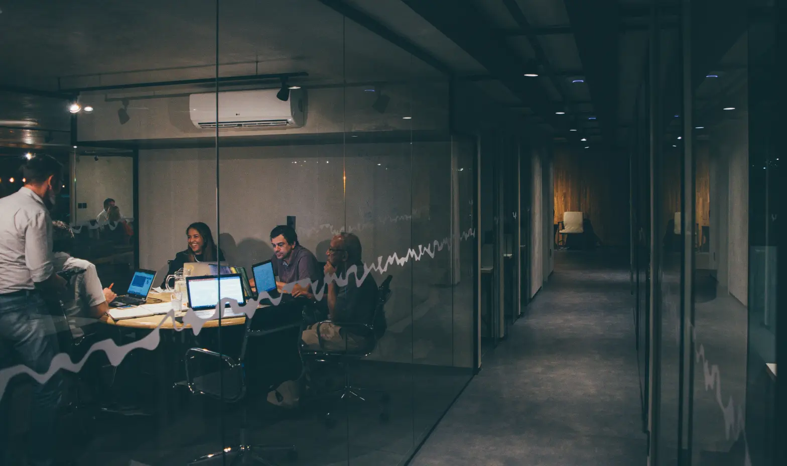 A group of people in a conference room